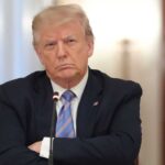 Trump Arms Folded